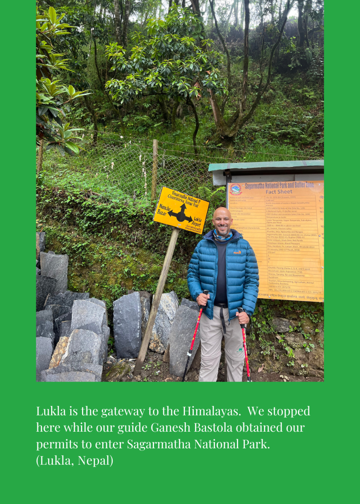 Mohamed Isa at the Sagarmatha National Park fact sheet near Lukla while permits were arranged