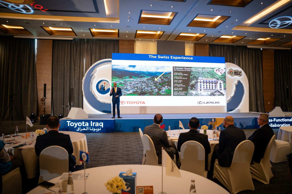 Mohamed Isa speaking on stage